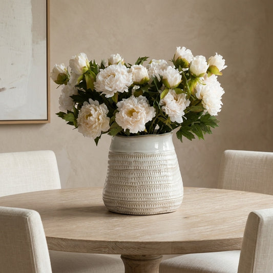 Tava Wide Hewn Ceramic Vase styled with white fashion peonies as a dining table centrepiece on a limewashed oak table — textured statement vase from Artanna