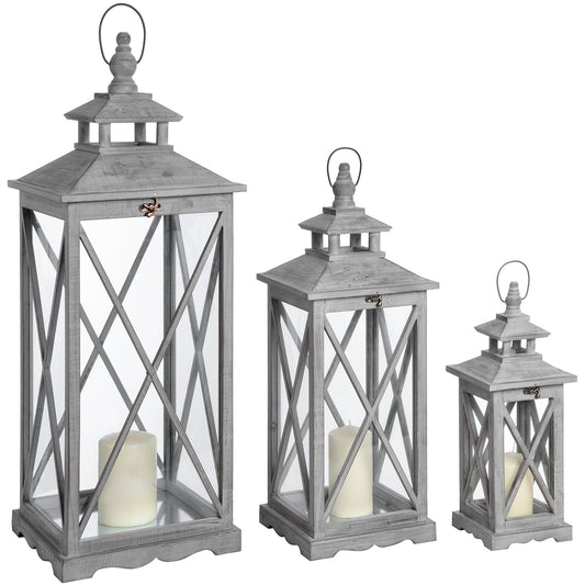 Set Of Three Wooden Lanterns With Traditional Cross Section image 0