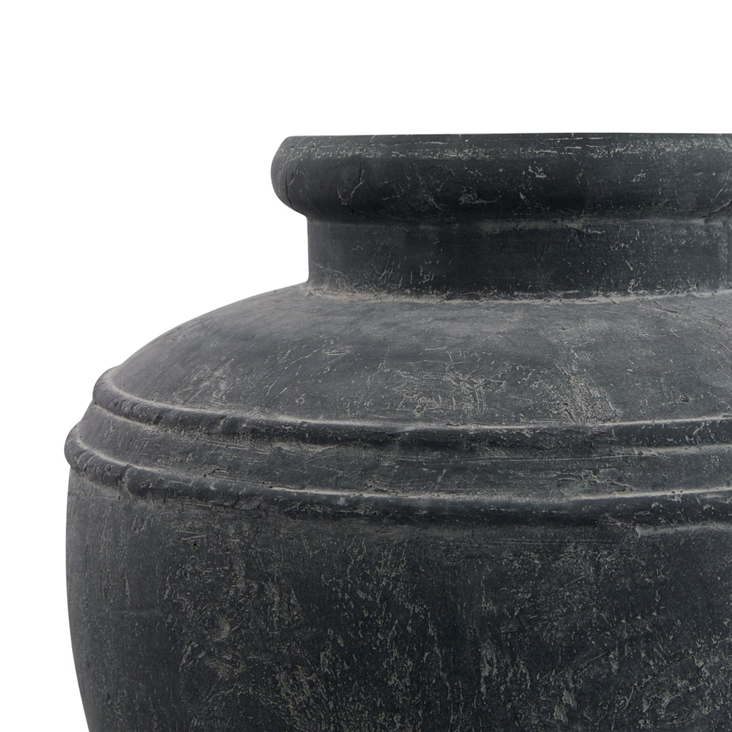 Close-up of a dark stone urn on a white background