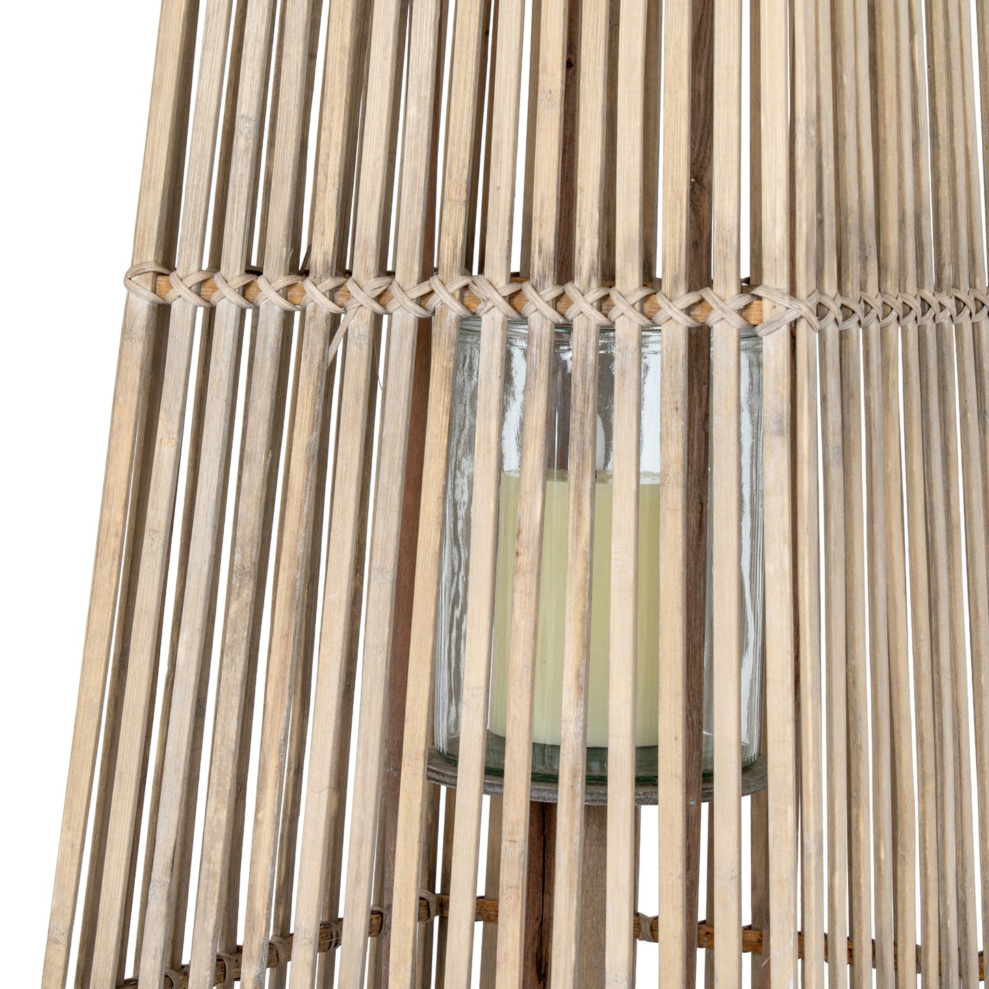 Wicker lantern with a glass container inside on a white background