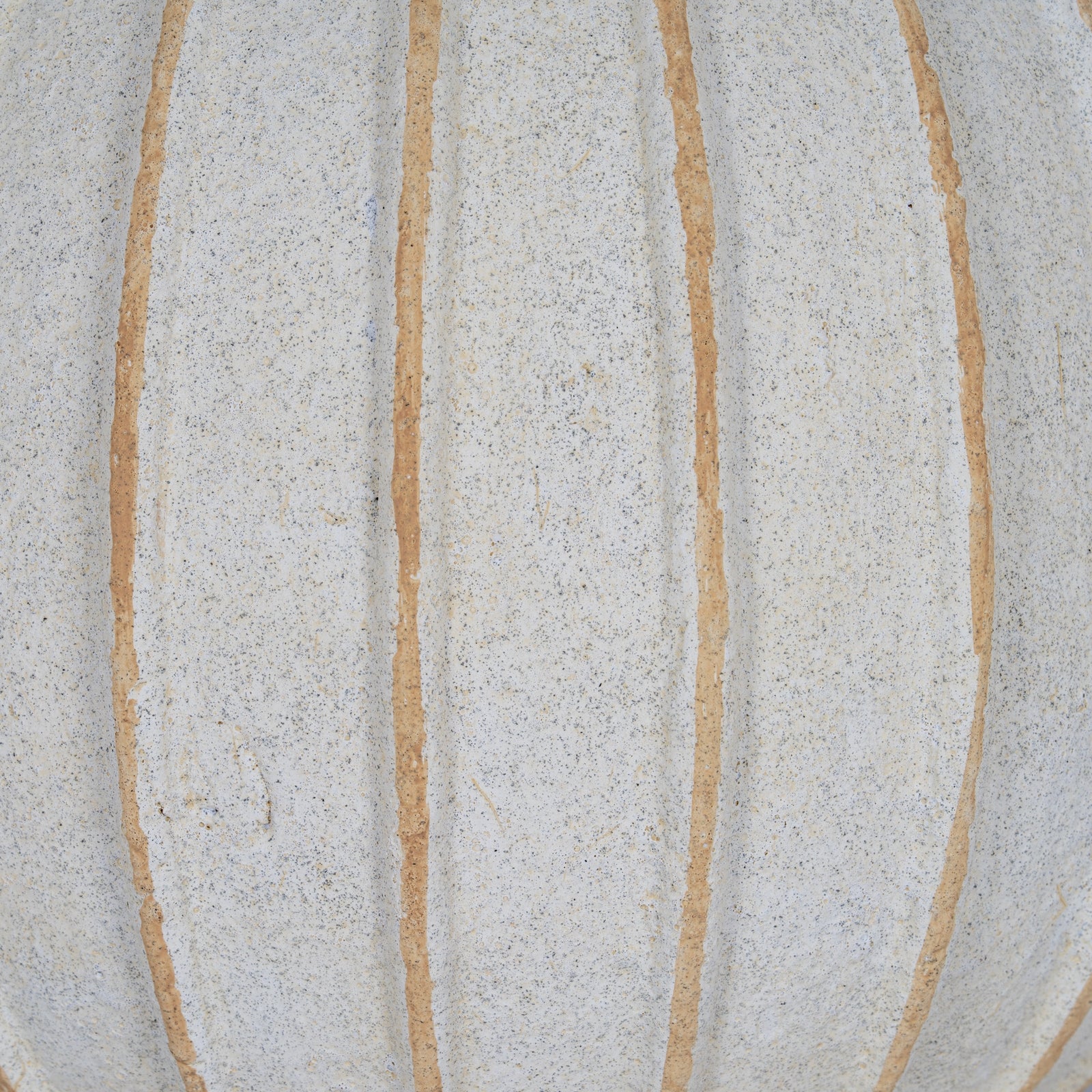 Close-up of a textured surface with beige lines