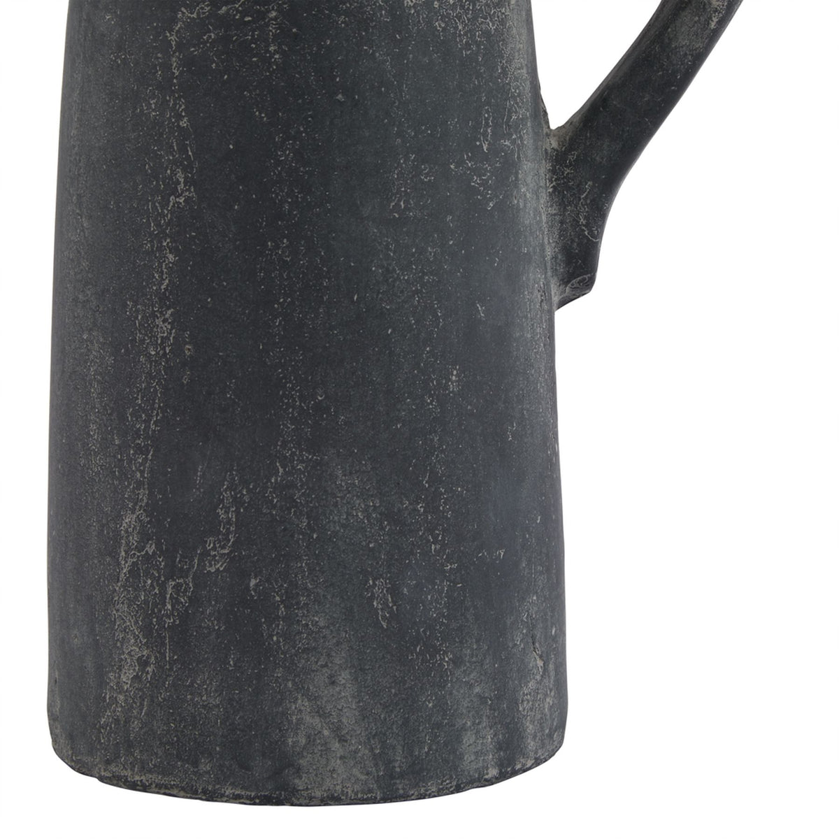 Black ceramic pitcher with a textured surface on a white background
