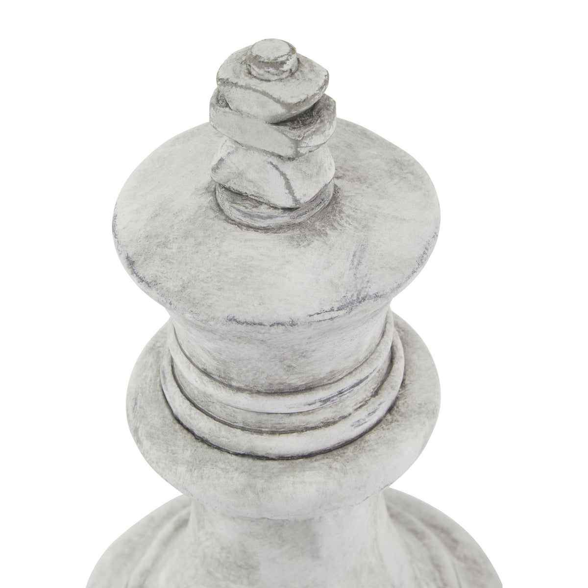 Decorative white stone object with a textured surface on a white background