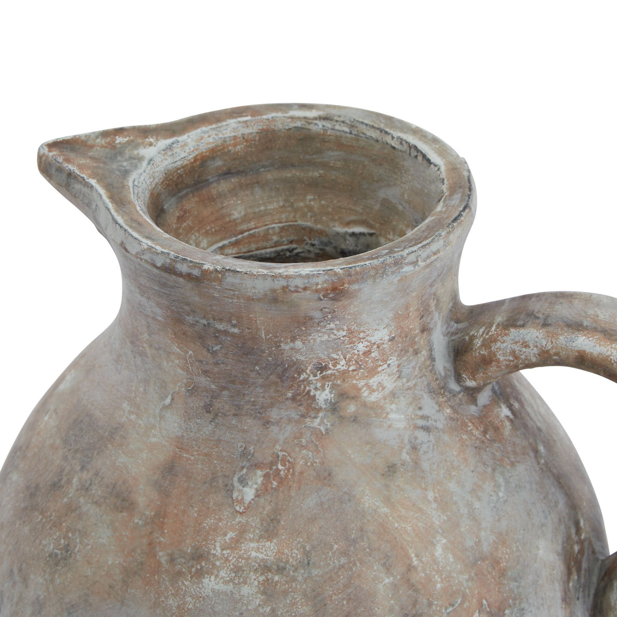 Close-up of a rustic clay pitcher jug on a white background
