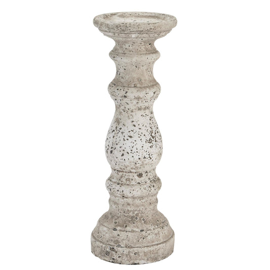 Decorative stone candle holder on a white background