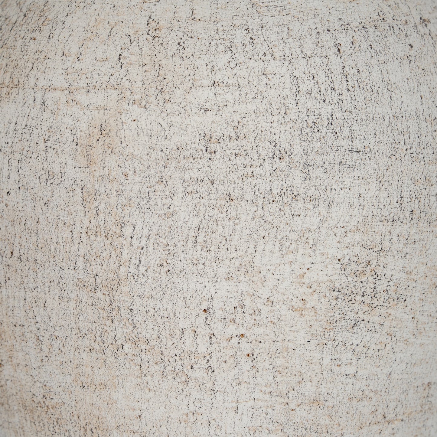 Textured beige surface with subtle variations