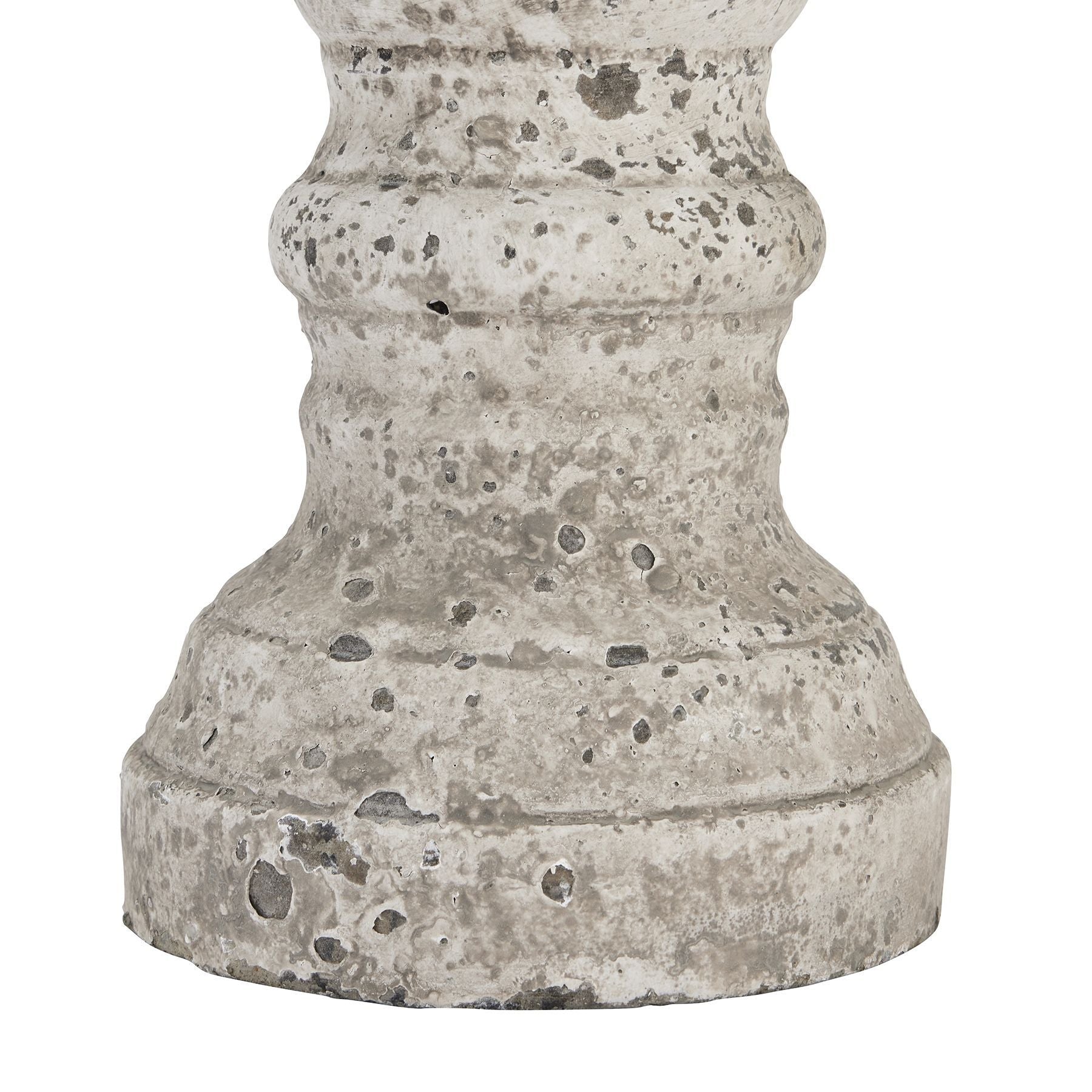 stone-effect heavy candle holder with textured surface on a white background